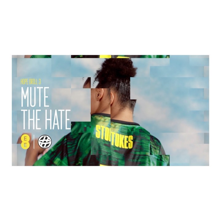 Female facing away with a green and black jersey with the text "STOiTOKES" in front of a blue sky background with text overlays.