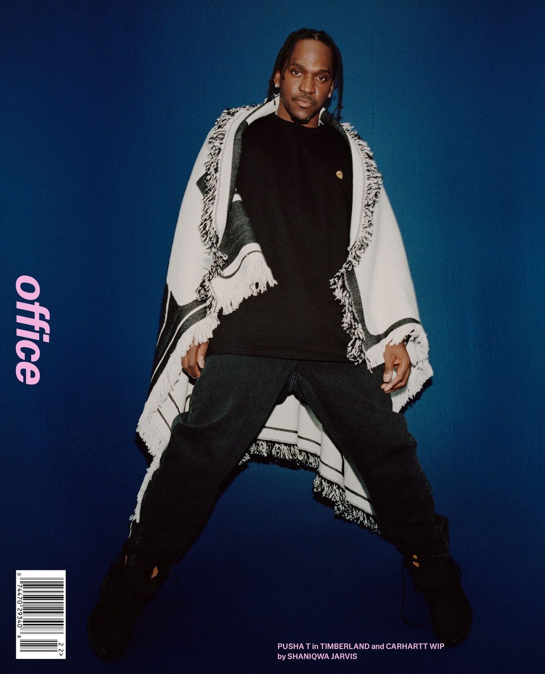 Magazine cover featuring Pusha T in a black t-shirt and draped shawl against a blue gradient background, shot in portrait orientation.