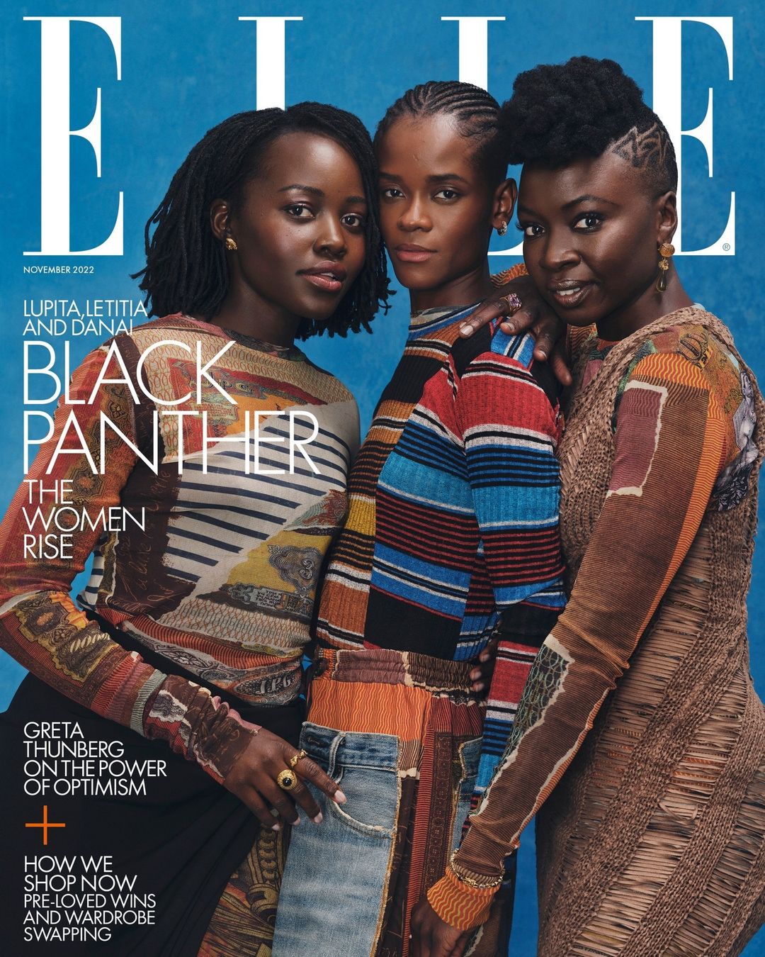 Elle magazine cover featuring Lupita Nyong'o, Letitia Wright, and Danai Gurira in colorful patterned clothing against a blue backdrop.