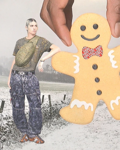 Woman in patterned shirt and pants with a Diesel belt stands in a snowy field holding a gingerbread man cookie with a Diesel bowtie.