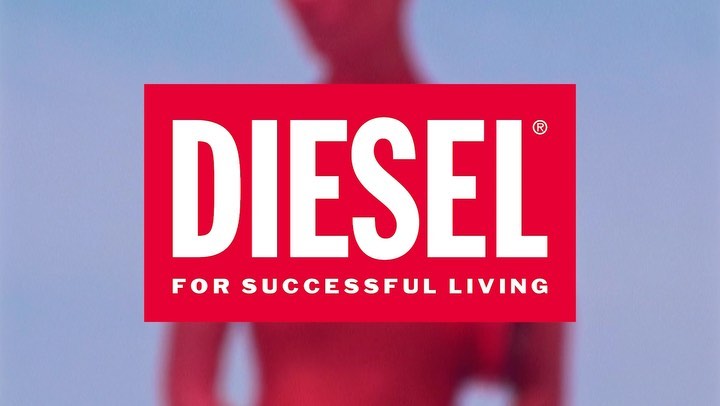 Diesel brand logo on a red rectangle with the tagline 'For Successful Living' against a blue gradient background with a blurry figure.