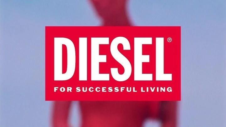 Diesel brand logo on a red rectangle with the tagline 'For Successful Living' against a blue gradient background with a blurry figure.