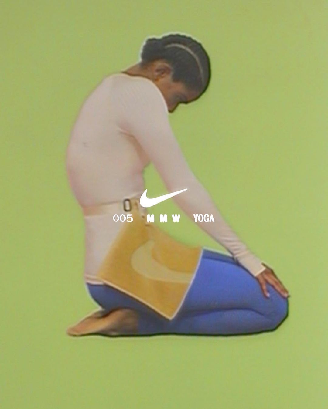Woman in activewear kneeling on a green surface, facing away from the camera in a yoga pose with brand logos visible.
