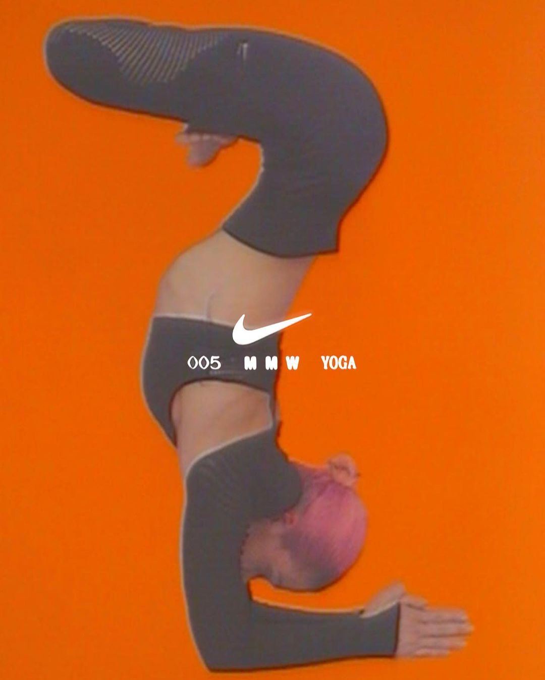 Person with pink hair in yoga pose against orange background, wearing gray workout clothes. Nike and MMW Yoga logo at center.