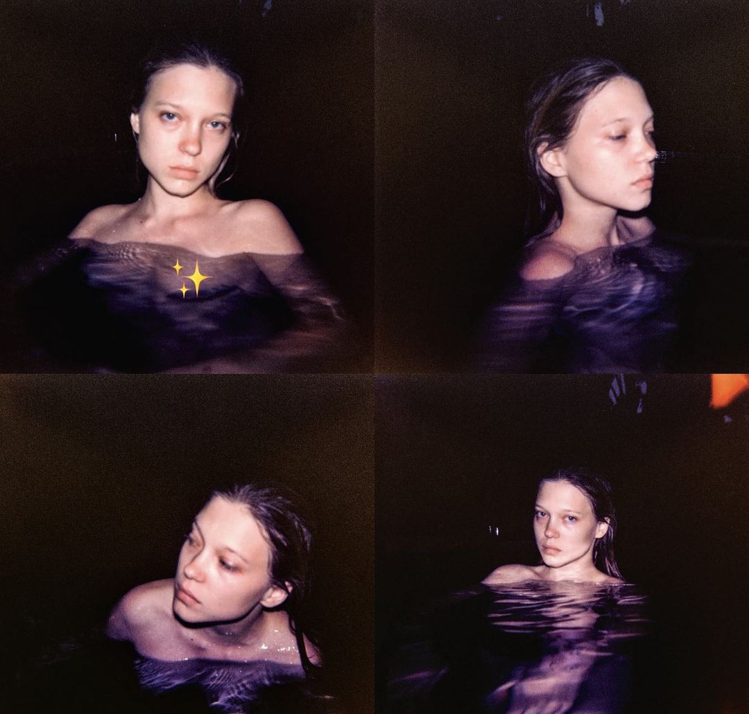 Polaroid composite of a fair-skinned adult female in water, with an eye-level angle, dark background, and shallow depth of field.