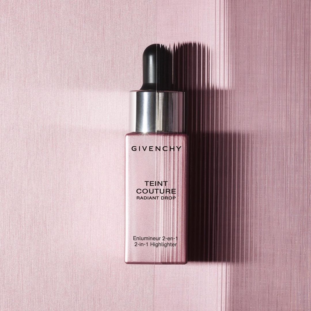 Givenchy Teint Couture Radiant Drop bottle of highlighter on a pink background with vertical stripes and shadow for beauty advertising.