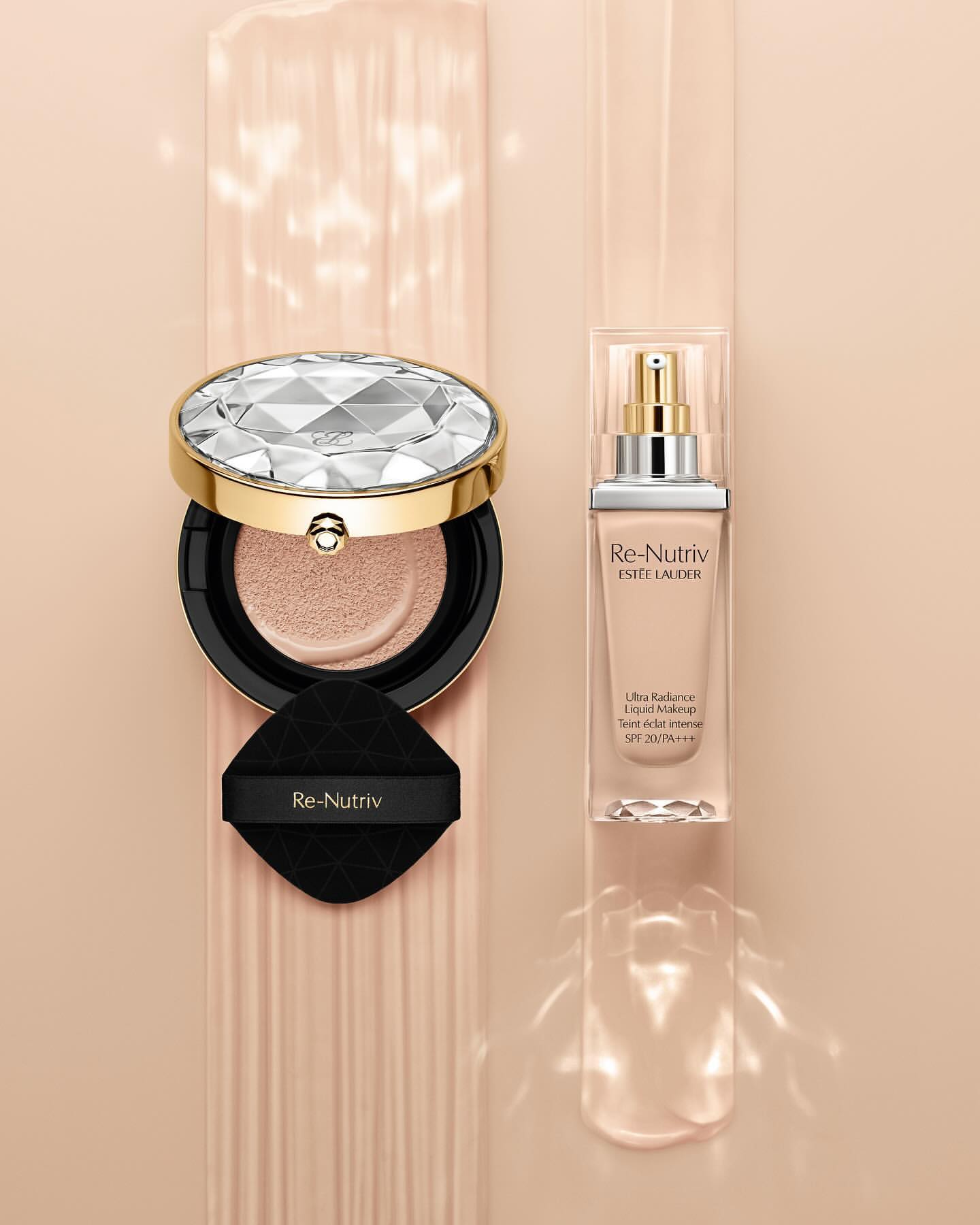 Luxury Re-Nutriv Estee Lauder foundation products in a light-beige color palette, including a cushion compact and liquid makeup.