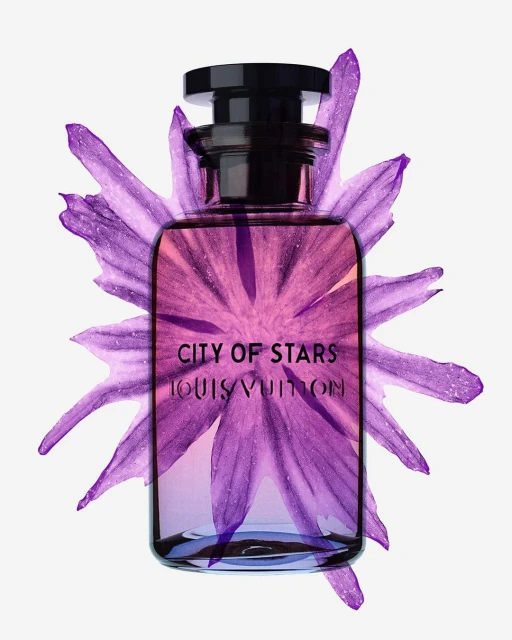 Fragrance bottle with purple floral design on a white background. Louis Vuitton City of Stars perfume bottle is prominent in the shot.