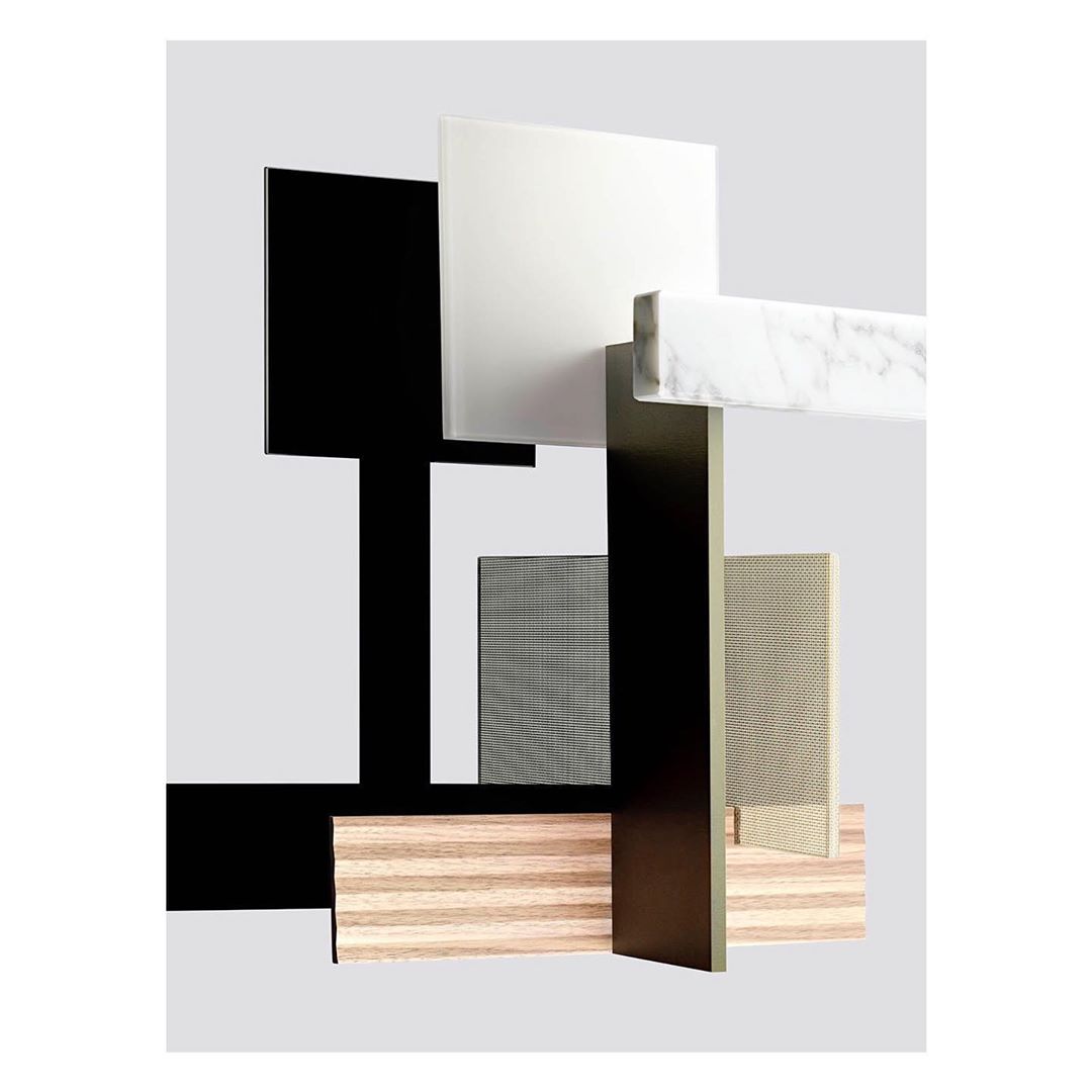 Abstract composition with white, black, and wooden geometric shapes on a grey background, showcasing modern design and textures.