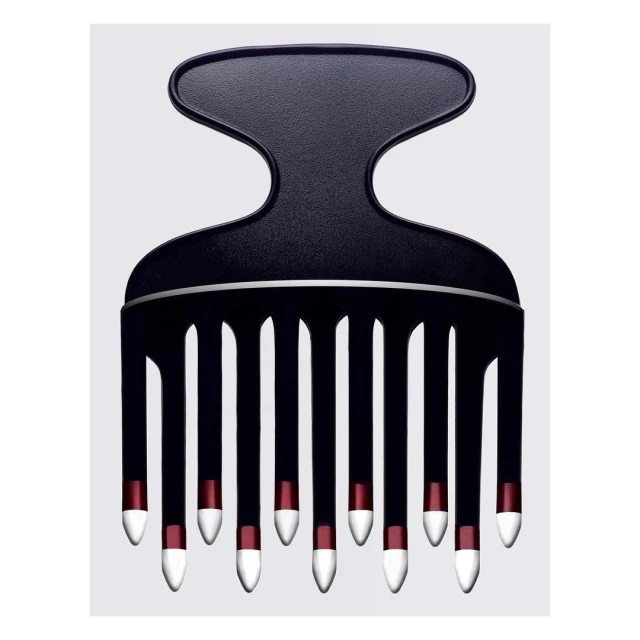 Studio shot of a black hair pick with red and white accents against a light grey background, showcasing a modern design and hair care tool.