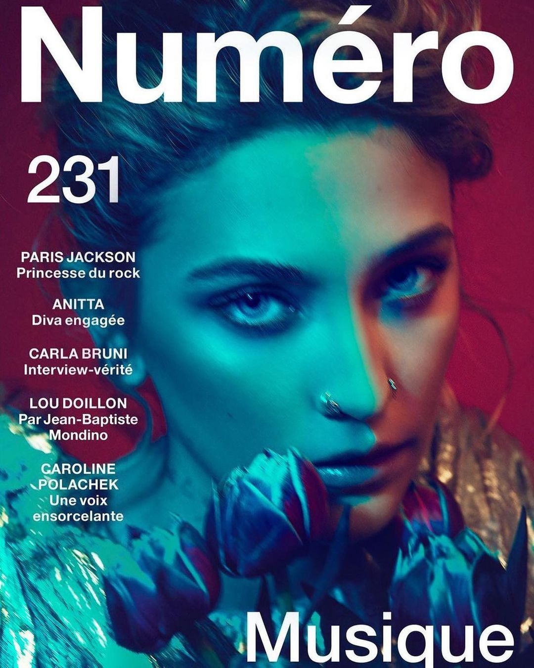 Numero magazine cover featuring a close-up of Paris Jackson's face with blue and red color grading and tulip flowers in the foreground.