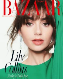 Close-up magazine cover portrait of Lily Collins wearing a vibrant green dress and dangling gemstone earrings against a white background