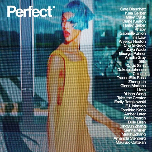 Model with blue hair and yellow dress featured on Perfect magazine cover with text listing names, indoor setting with natural and diffused light.
