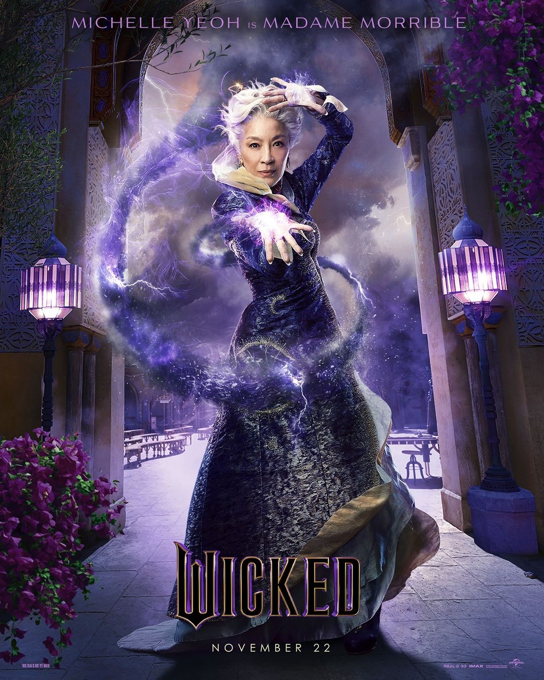 Michelle Yeoh as Madame Morrible in Wicked movie poster, showcasing her magical abilities with swirling purple energy in a fantasy setting.
