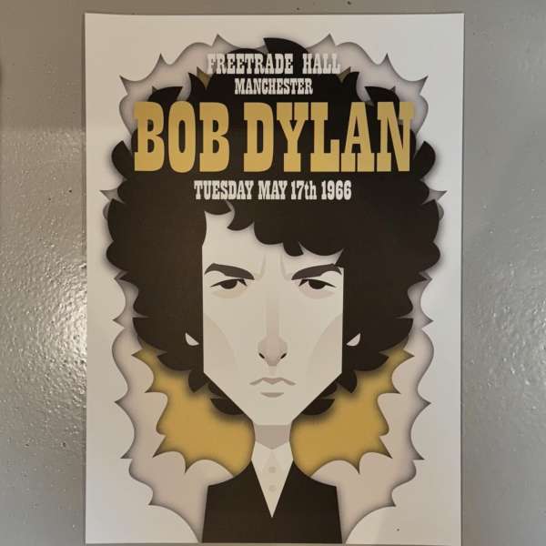 Illustrated poster featuring Bob Dylan at Free Trade Hall, Manchester, May 17, 1966, on a white background with black and gold accents.