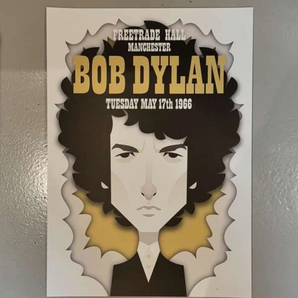 Illustrated poster featuring Bob Dylan at Free Trade Hall, Manchester, May 17, 1966, on a white background with black and gold accents.