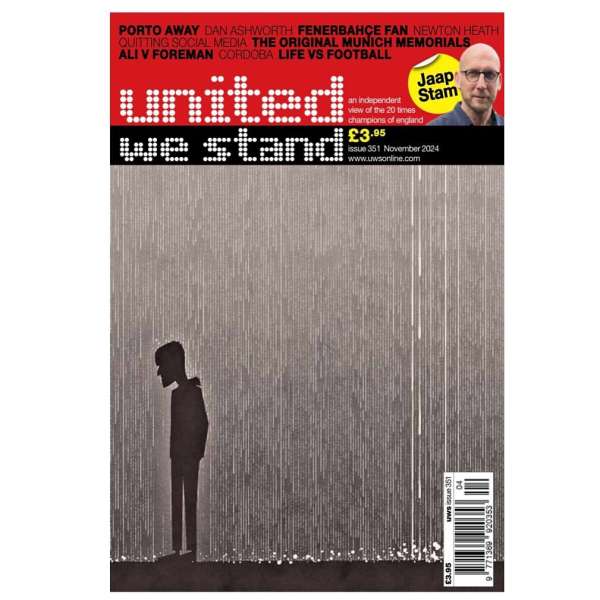 Magazine cover features a solitary figure in silhouette against a rainy backdrop, with the title 'United We Stand' prominently displayed.