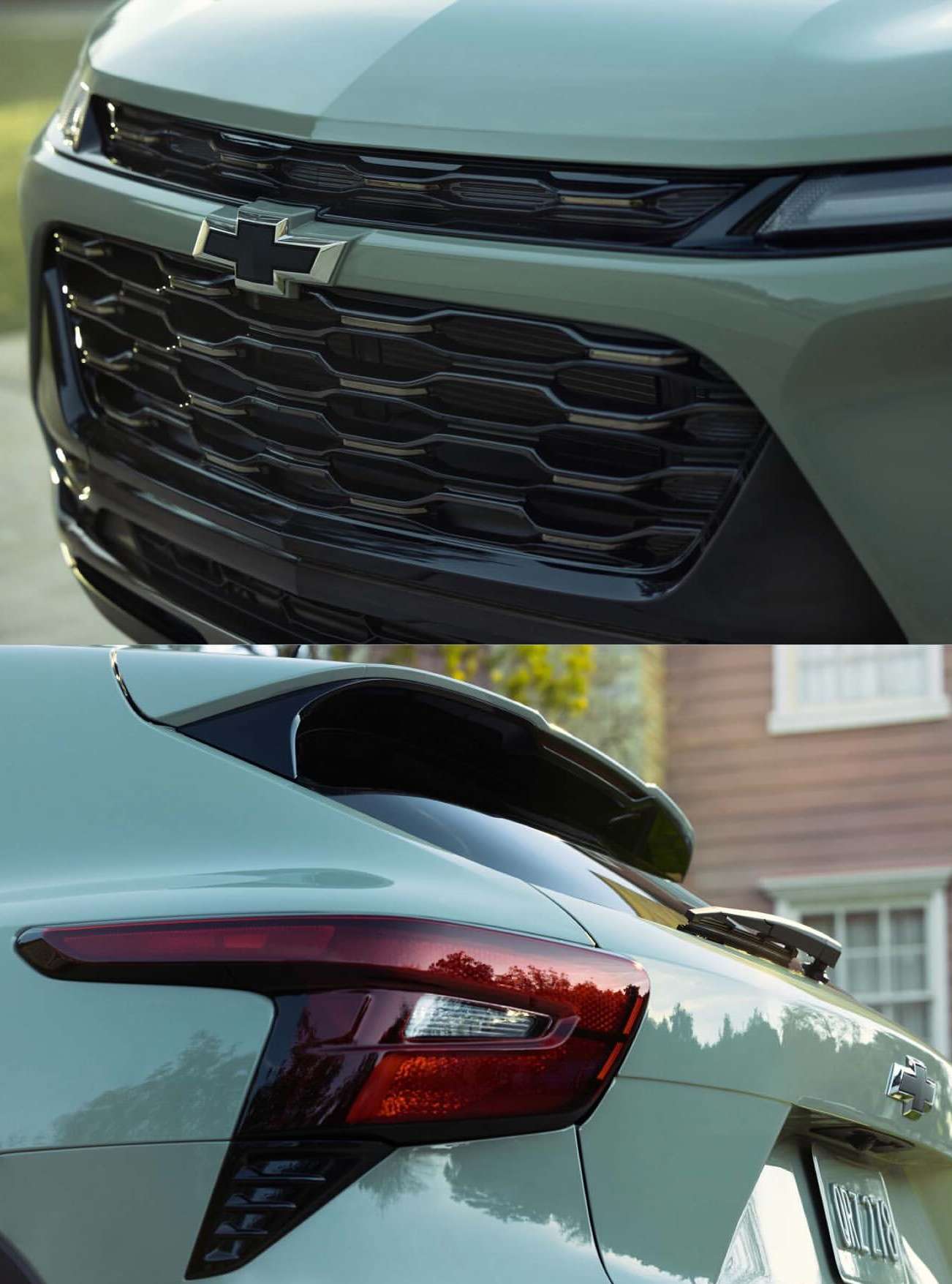 Close-up of a light green Chevrolet SUV featuring a honeycomb grill, tail light, and spoiler, set in front of a house.