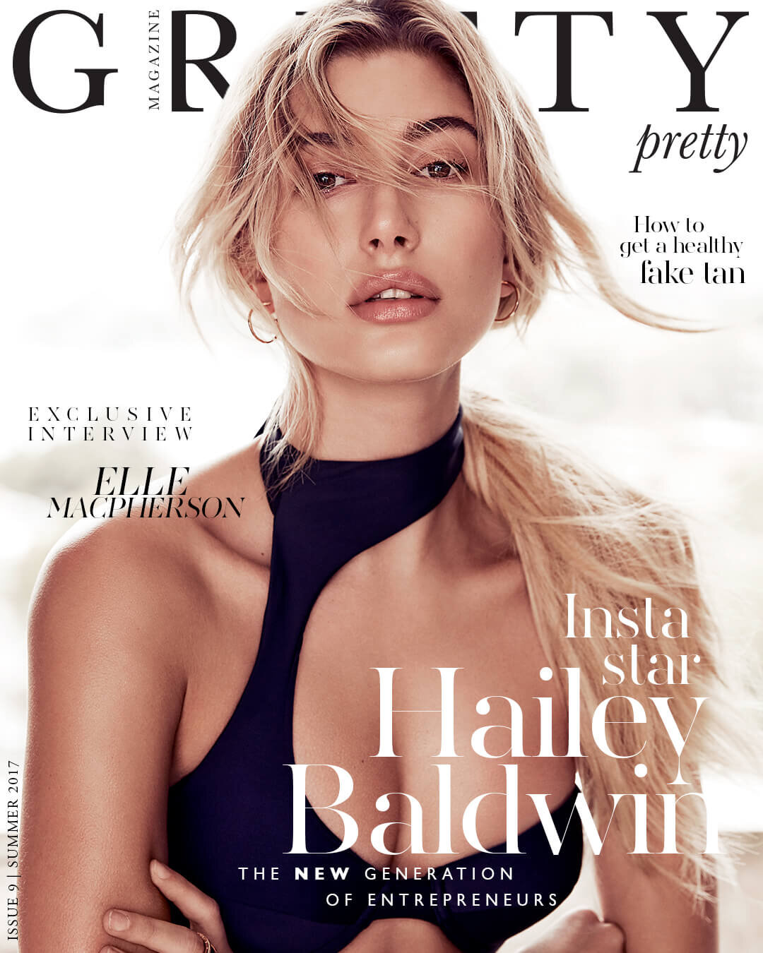 Magazine cover featuring a blonde female model with fair skin, wearing a black swimsuit, and posing against a soft gradient background.