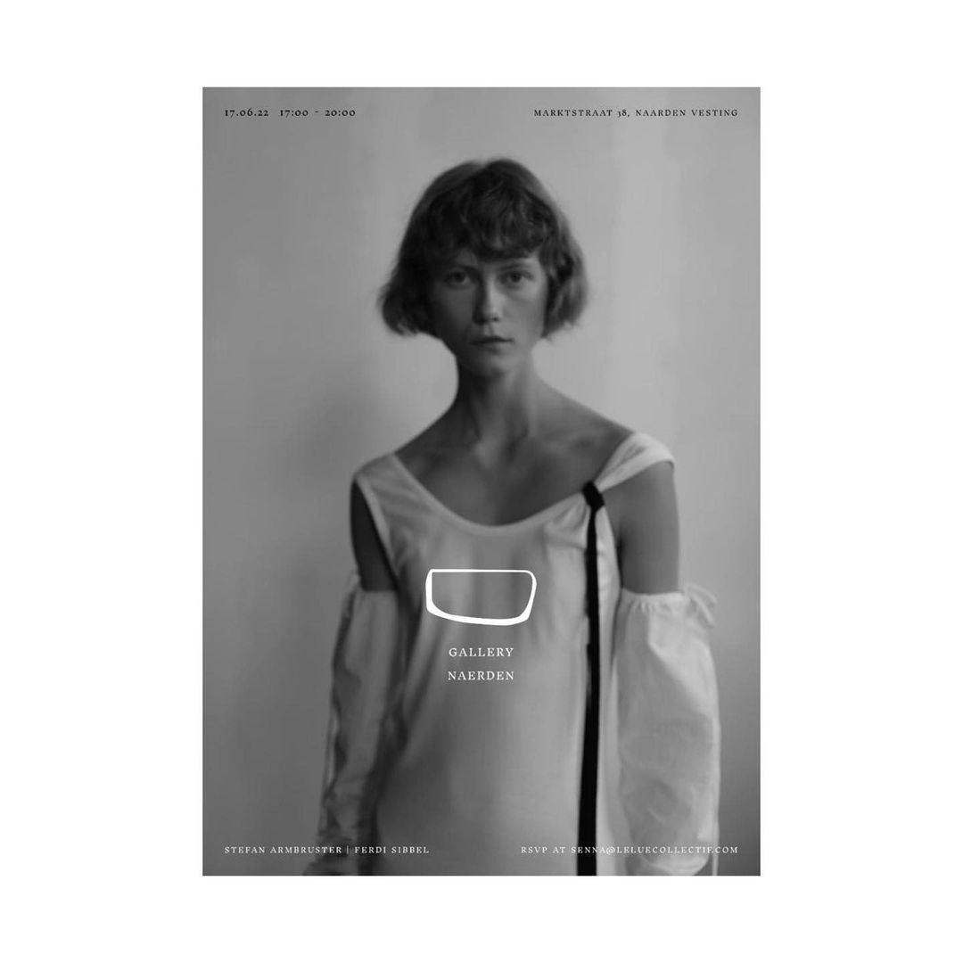 Black and white promotional image of a young adult female model wearing an off-shoulder dress, with gallery text overlay.