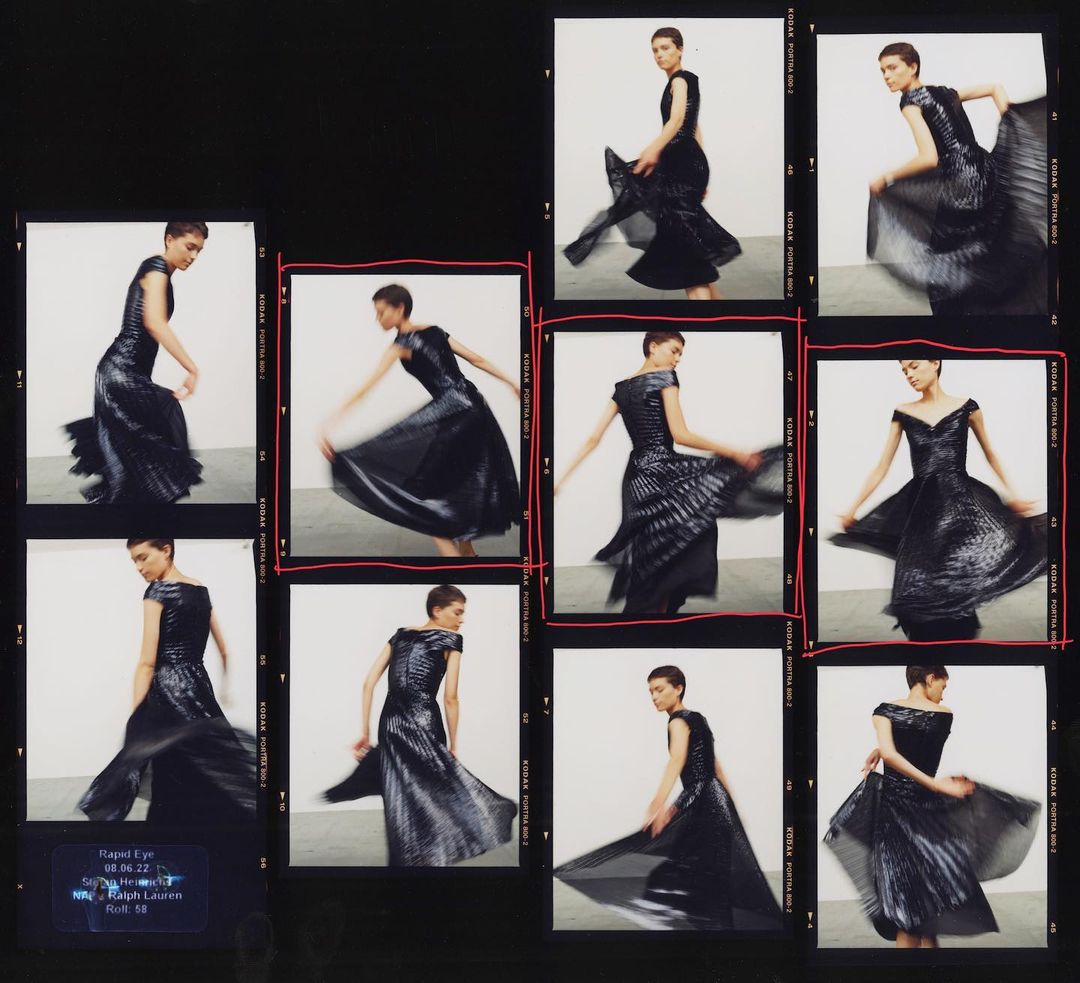 Fashion shot of a woman in a dark off-shoulder dress with a pleated skirt captured in multiple action frames with a black background.