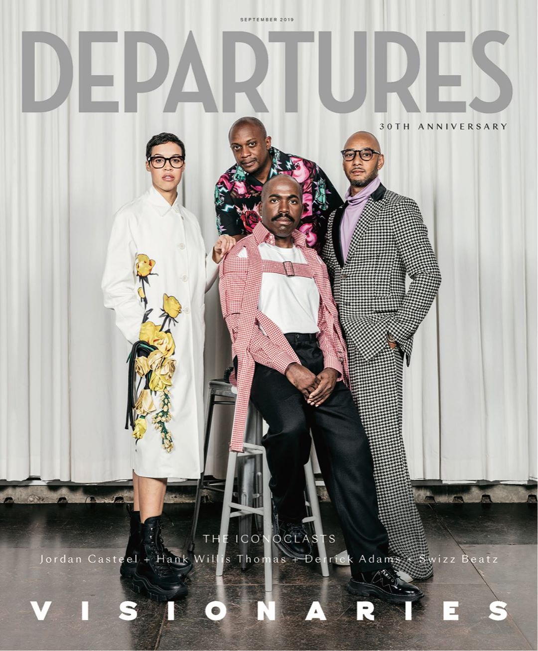 Magazine cover featuring four Black adults dressed in patterned, colorful clothing, posing against a white backdrop for DEPARTURES 30th Anniversary.
