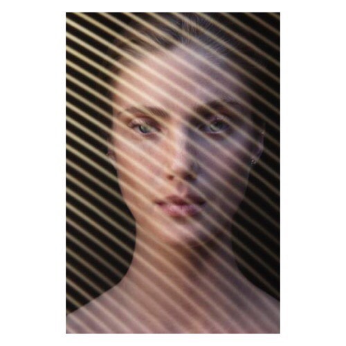 Striking portrait of a woman with light skin, featuring shadows of parallel lines across her face. The image evokes a sense of mystery.