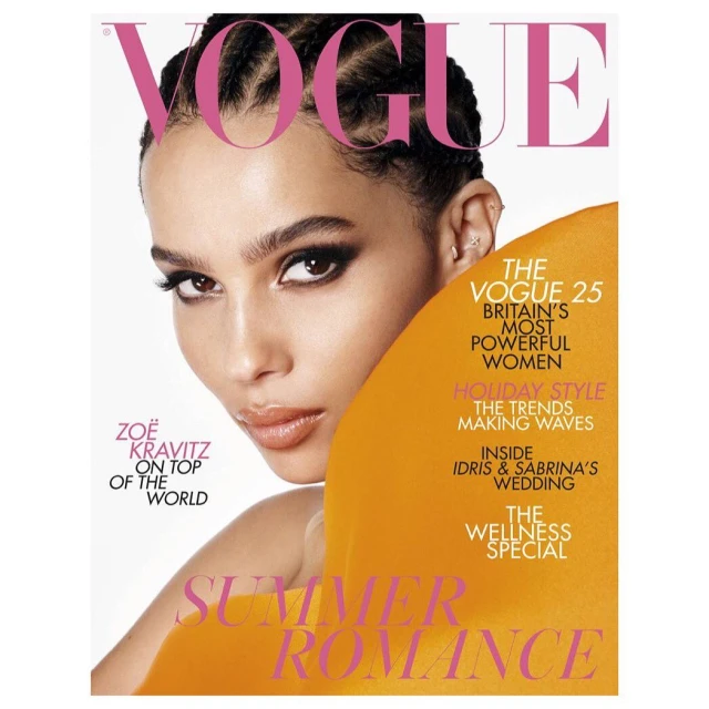 Close-up of Zoë Kravitz on the cover of Vogue. Magazine features the headline “Summer Romance,” plus articles on beauty and style.