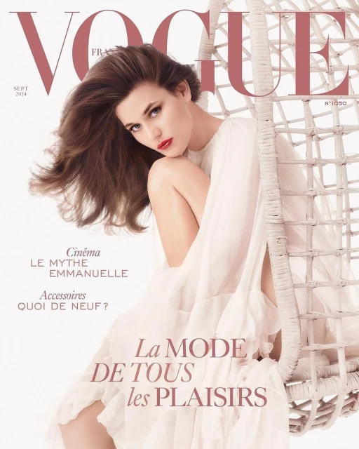 Vogue France cover featuring a woman in a white dress seated in a hanging wicker chair. The cover has the vogue title and date.
