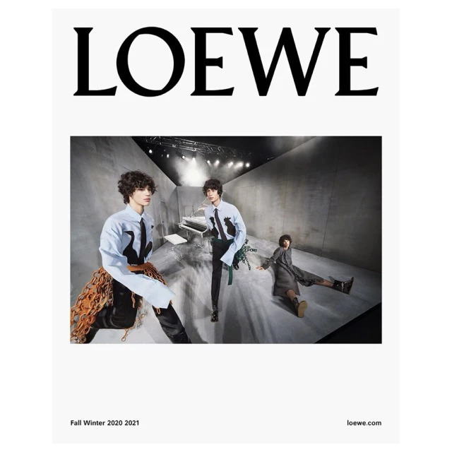 Loewe fashion campaign featuring three adult male models wearing stylish shirts and black pants in a photo studio setting with a piano.