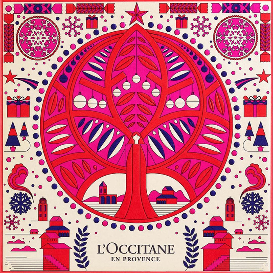 Festive holiday illustration with a bright pink and red Christmas tree, snowflakes, gifts, and a L'Occitane logo on a cream background.
