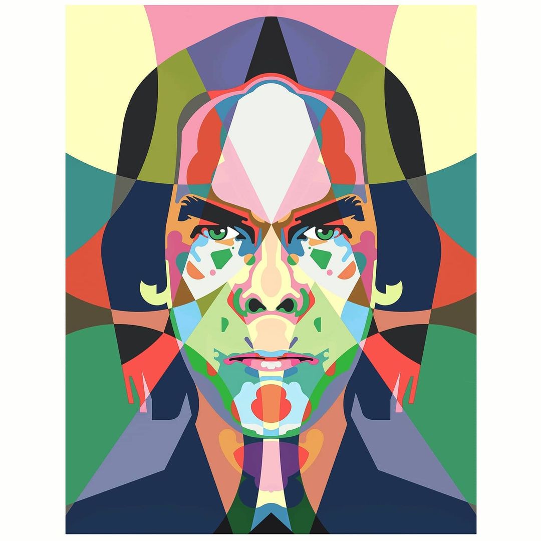 Abstract portrait of a man with dark hair, featuring a geometric composition in multiple bright colors on a neutral background.