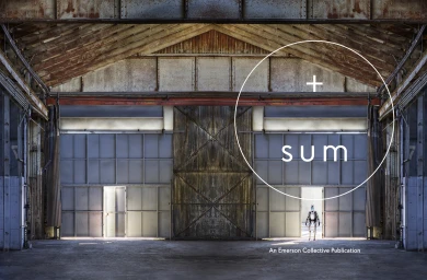 Symmetrical view inside a large industrial warehouse with a small humanoid robot standing in the doorway, created by Preston Chaplin.