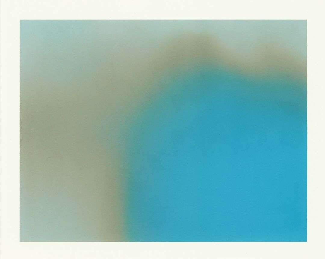Abstract color field painting with blends of blue, grey and beige on a white background, created with soft gradients.