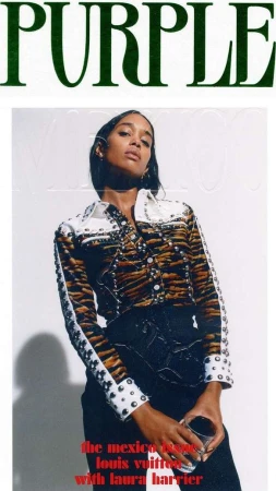 Portrait of a woman holding a glass in a studio setting wearing a jacket against a white backdrop for a magazine cover.