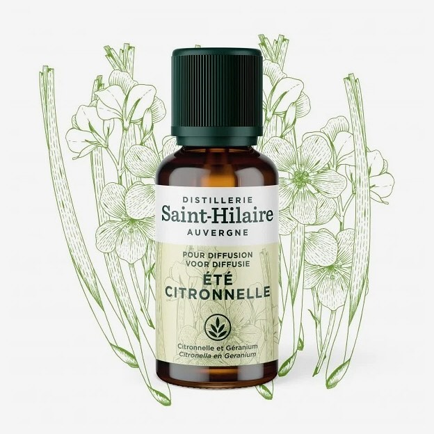 Essential oil bottle by Saint-Hilaire with plant illustration in background. Aromatherapy product with a green and brown bottle design.