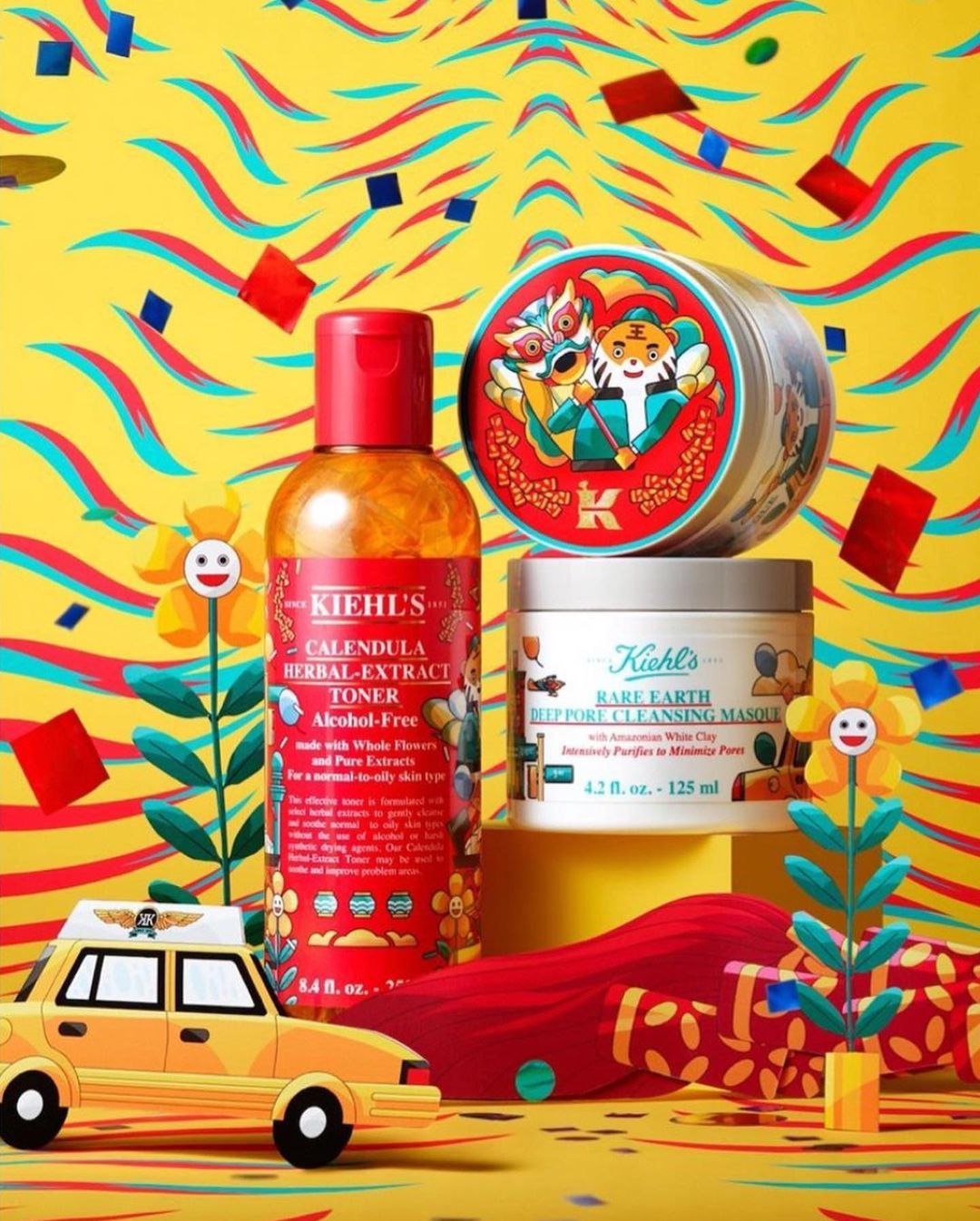 Kiehl's skincare product line including Calendula toner, Rare Earth mask, and limited edition tin with confetti and toy car.