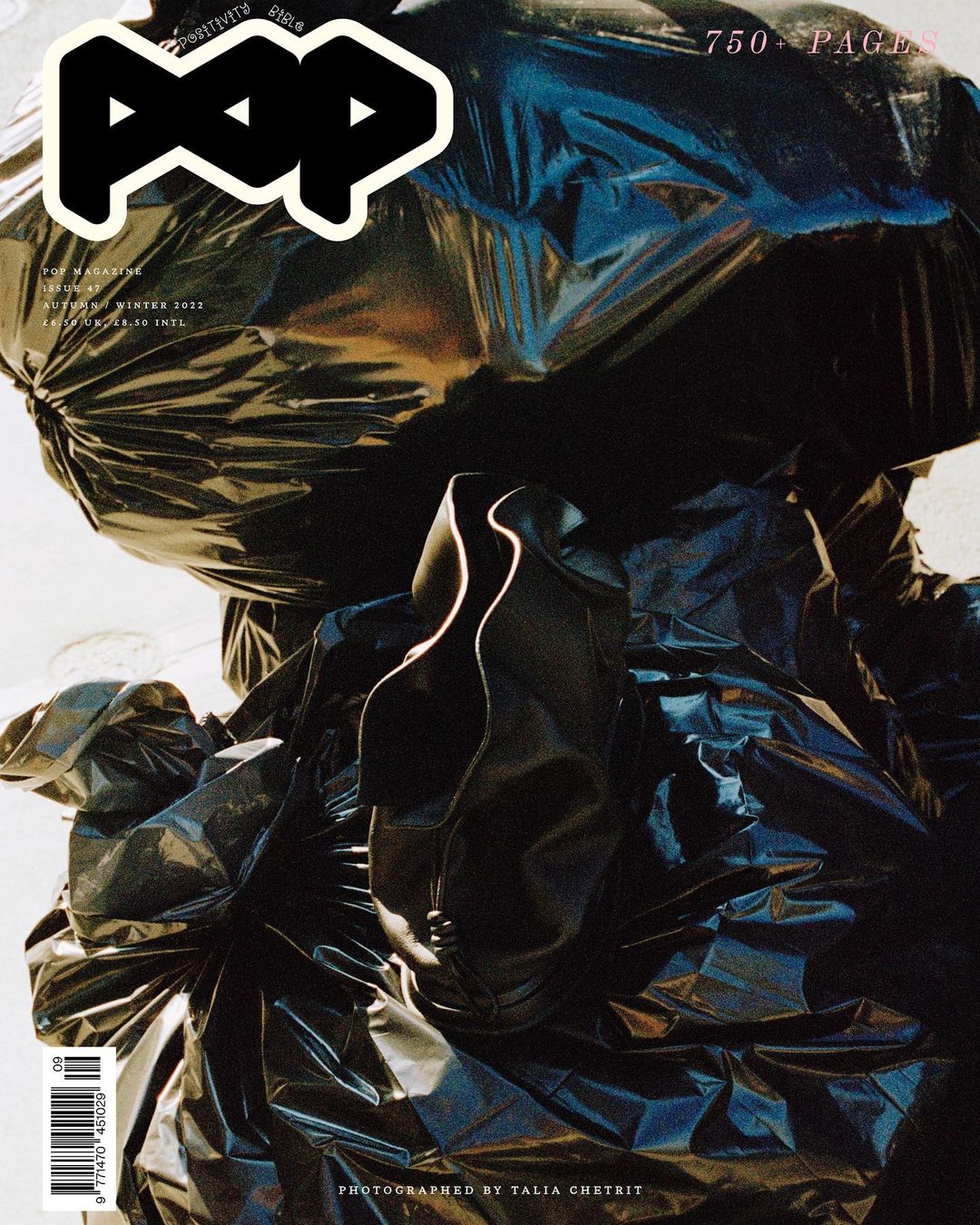 Fashion magazine cover features POP logo above black garbage bags, creating a striking contrast for visual interest and editorial appeal.
