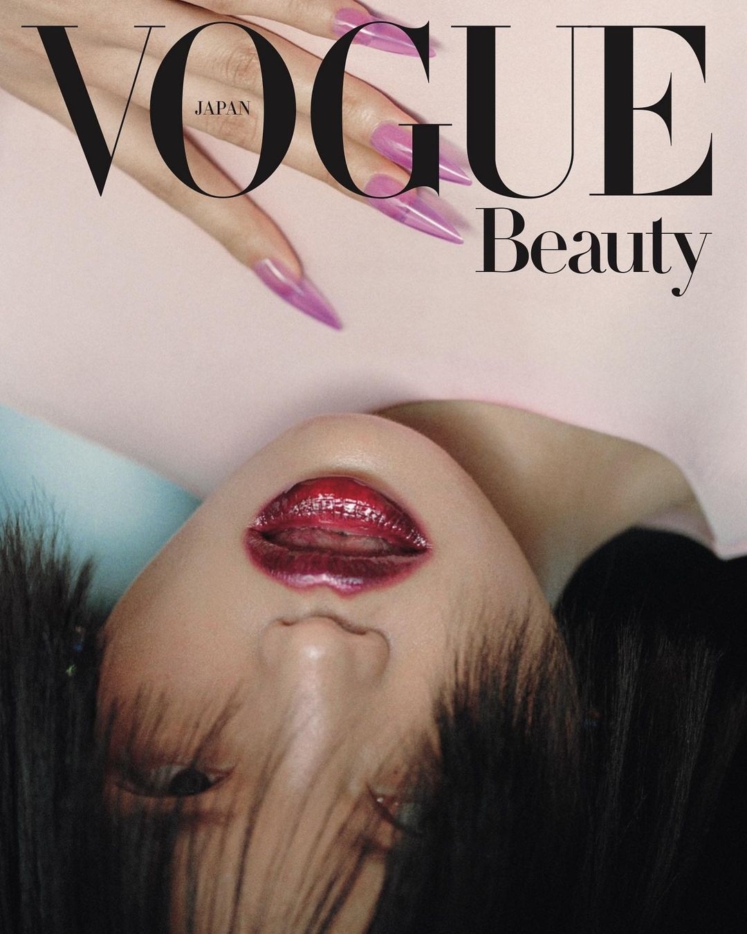 Vogue Japan Beauty cover featuring a woman with glossy lips, long nails, and dark hair, with the magazine's logo at the top.