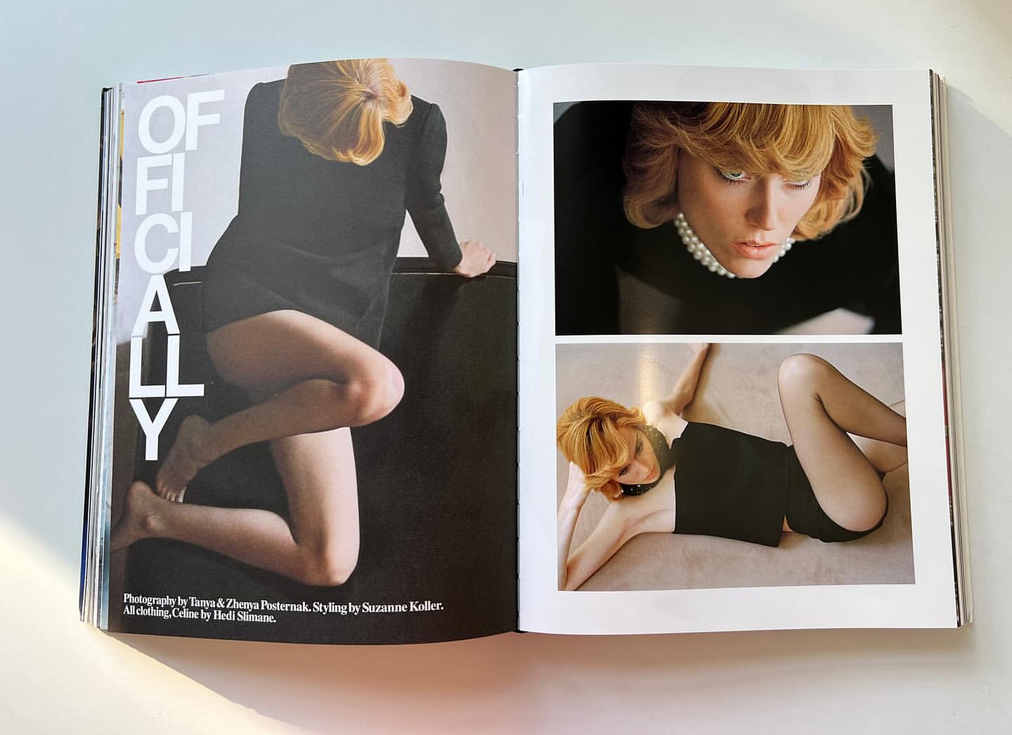 Fashion editorial spread in magazine features a redhead adult woman posing in dark clothing against a neutral backdrop in different photographs.