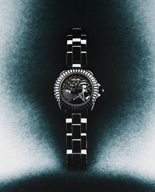 High-angle close-up of a designer wristwatch with black and white band, showcasing Chanel logo, against a mottled dark blue background.
