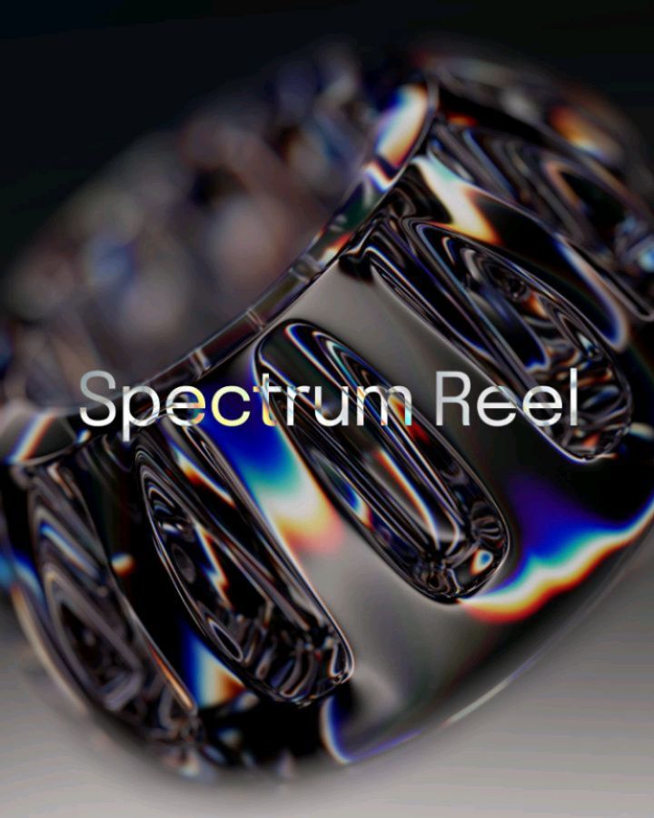 Abstract render featuring a fluid, iridescent material with complex reflections and refractions, set against a blurred dark background.
