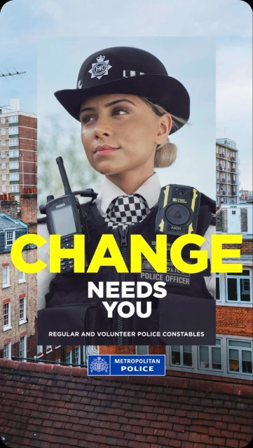 Portrait of a young, fair-skinned female police officer wearing a hat and uniform with buildings in the background. Recruitment poster.