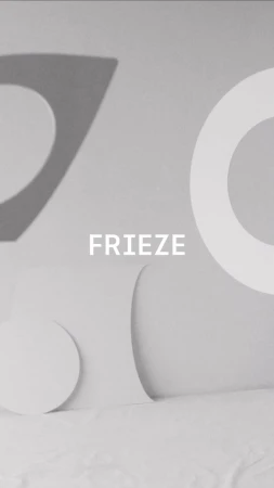 Abstract monochromatic image with white geometric shapes against a light gray background, including the word FRIEZE in the center.