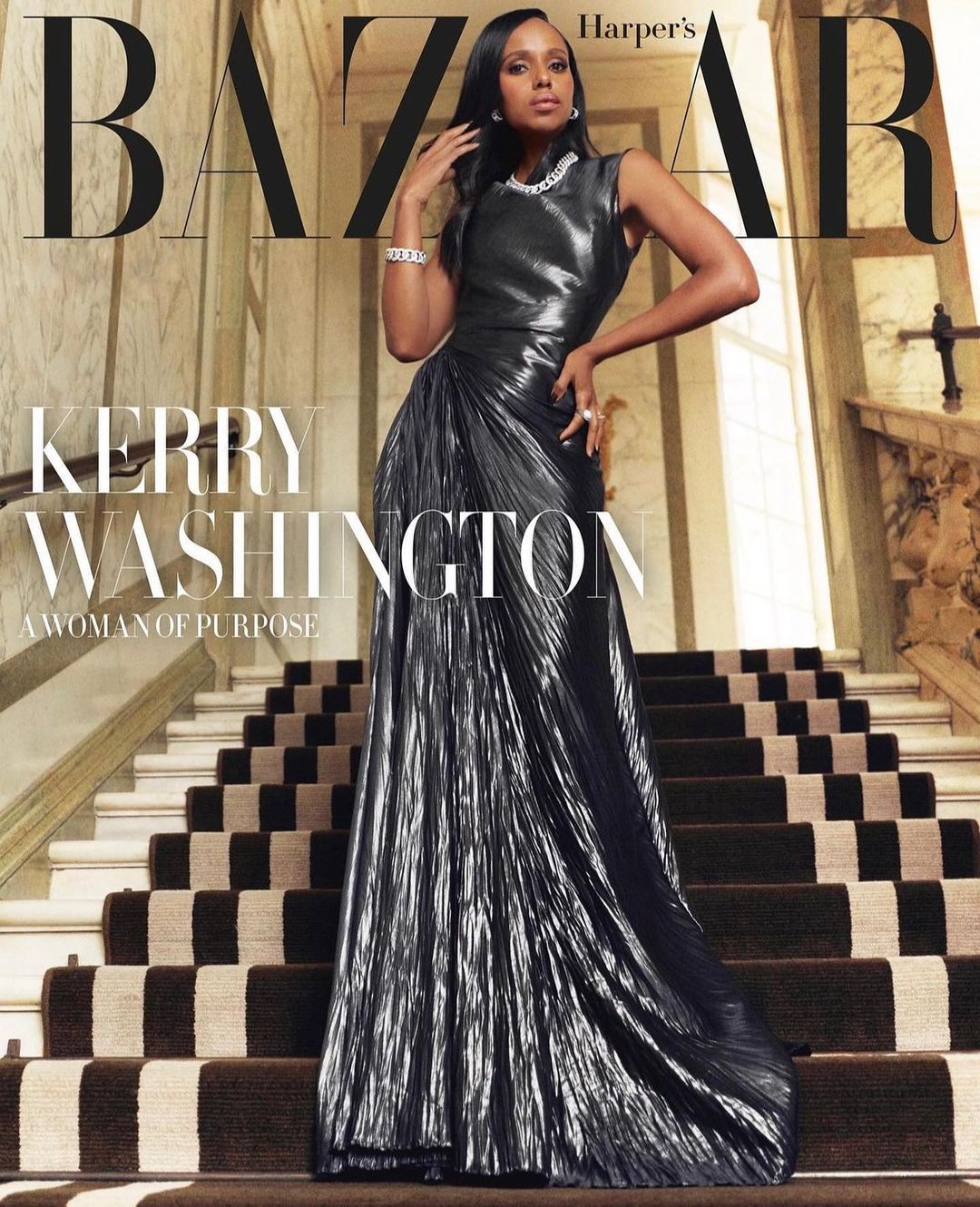 Kerry Washington on Harper's Bazaar magazine cover, wearing a sleeveless black dress, posing on marble stairs in an indoor environment.