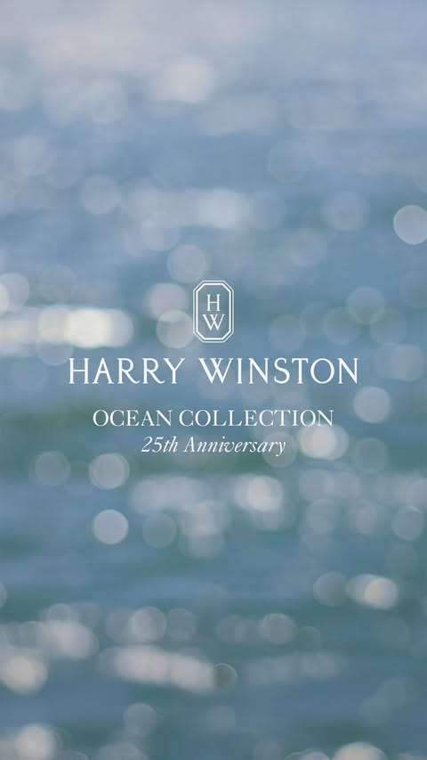 Harry Winston Ocean Collection 25th Anniversary ad featuring a blurred blue ocean background with bokeh effect and logo and text.