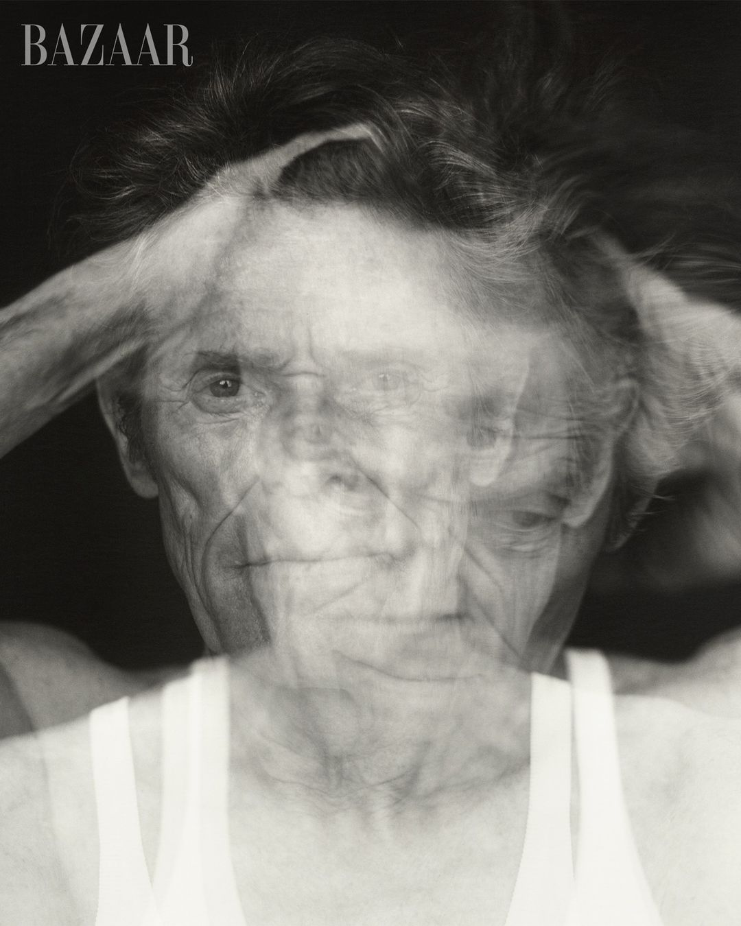 Monochromatic portrait featuring an elderly person with short hair against a dark background. The image shows multiple exposures.
