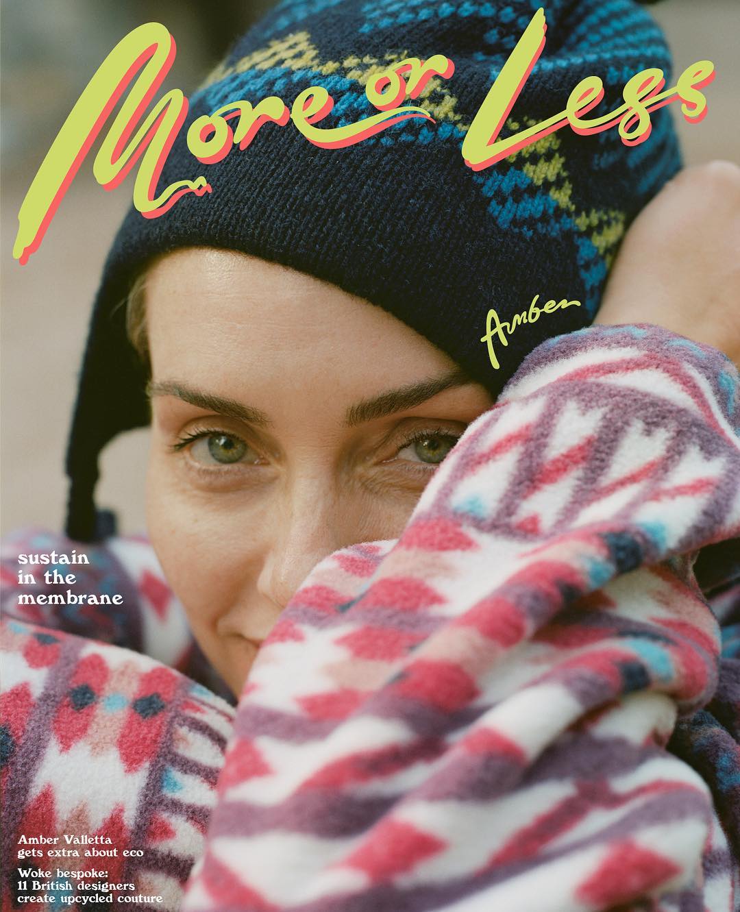 Close-up of a fashion magazine cover featuring a woman in a patterned hat and top, with the title 'More or Less' visible on the cover.