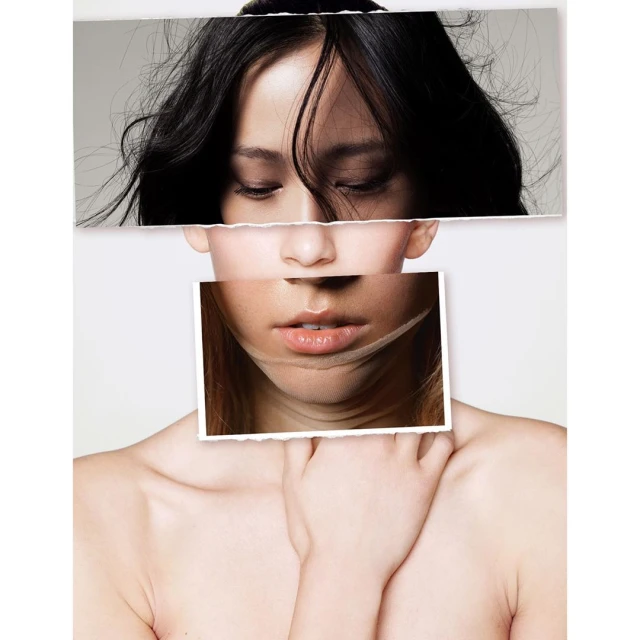 Conceptual portrait of a young woman with dark hair, constructed from fragments and photographed on a white background in studio lighting.