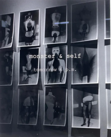 Gallery wall displaying a collection of black and white art photographs with text overlay promoting an exhibition event 'monster & self'.